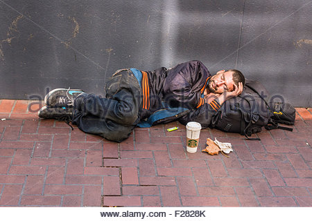 a-30s-homeless-man-sleeps-lying-down-on-a-sidewalk-in-san-francisco-f2828k[1]